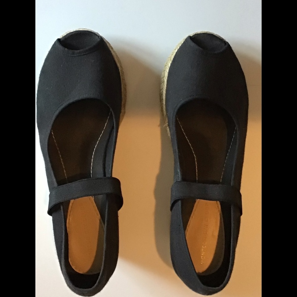 Black canvas wedge uppers with peep toe